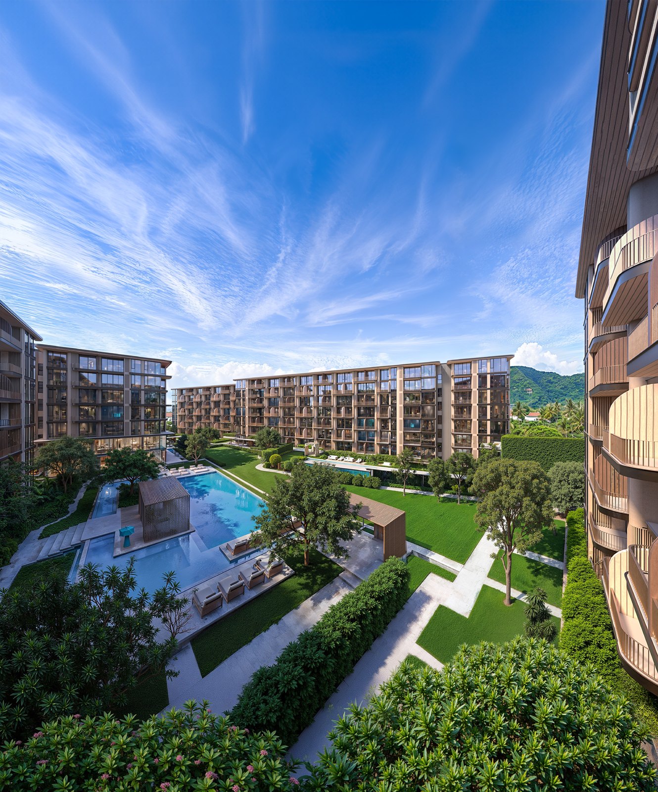 Looking down on the courtyard, the pools and the green hills beyond