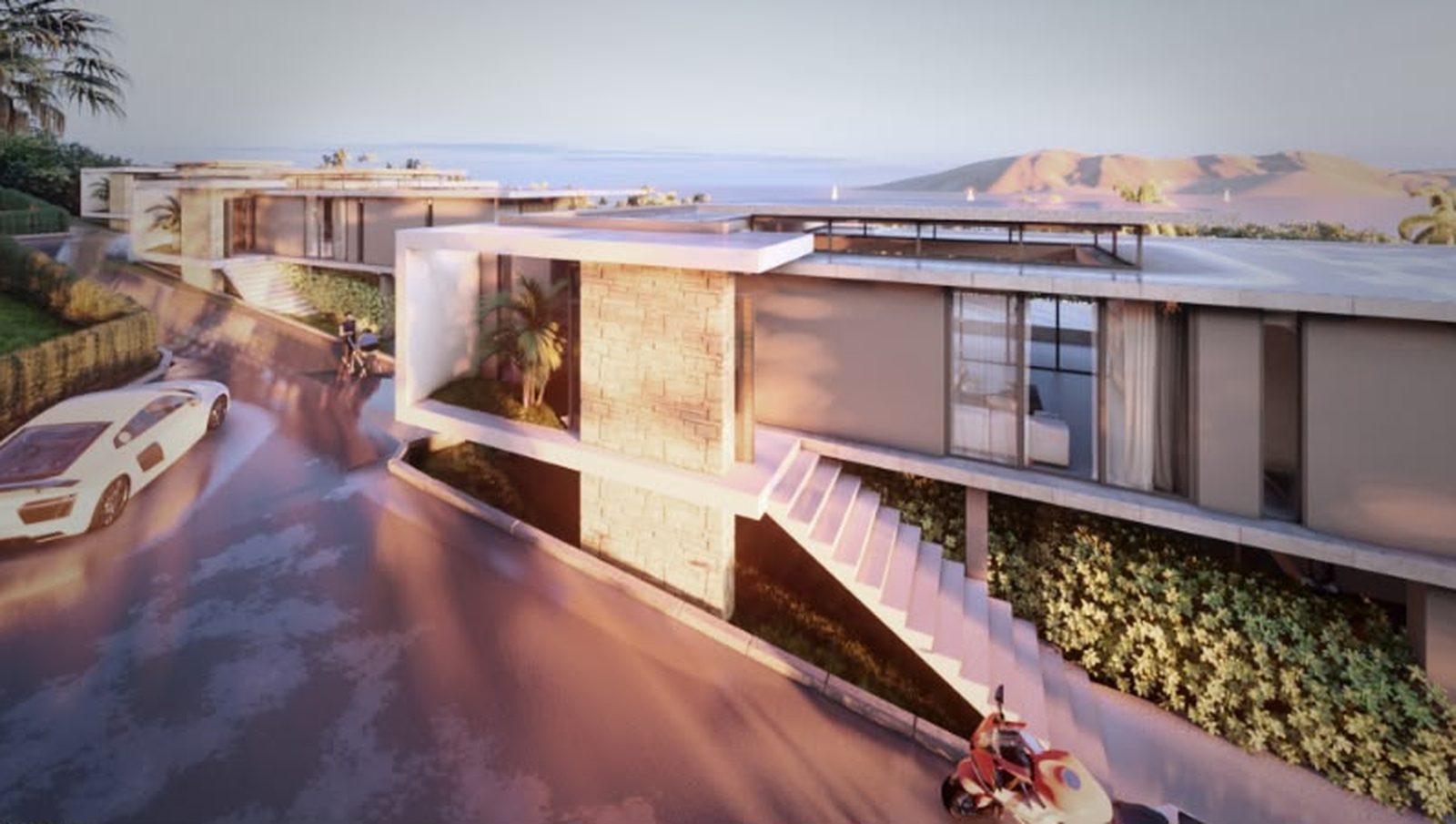 Hillside community above the coast at dusk