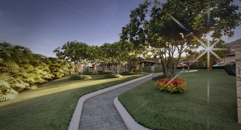 Landscaped garden path through the estate at dusk