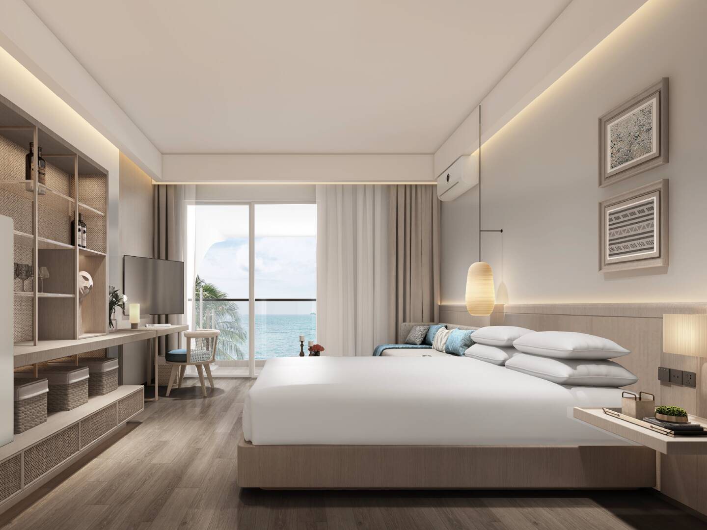 A studio apartment, with the bed, desk and storage wall