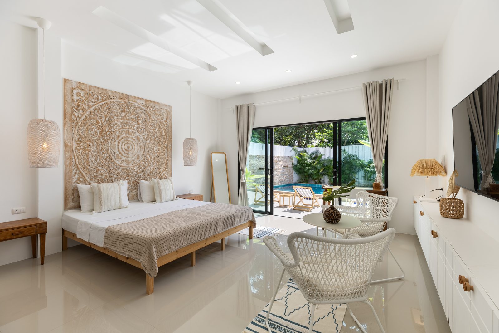 Bedroom looking out to the pool terrace