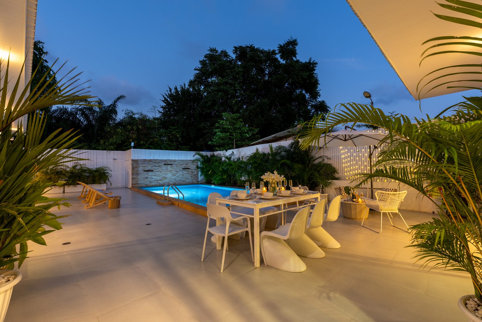 The pool terrace at dusk