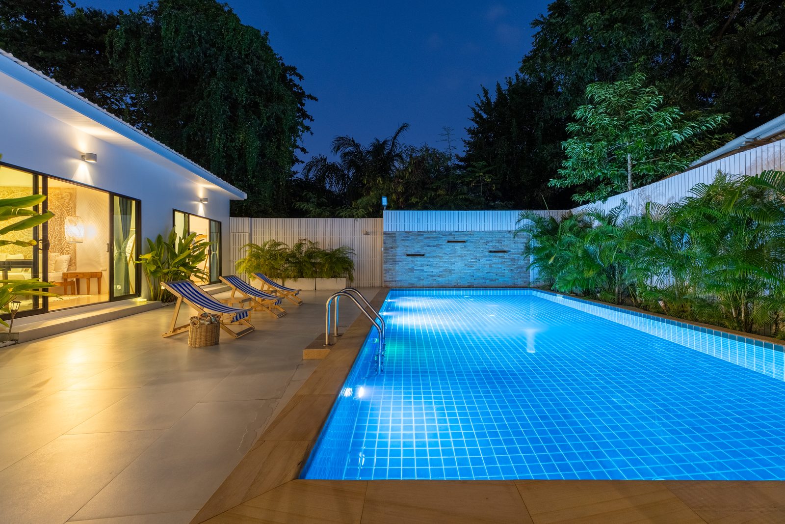 The pool lit at night