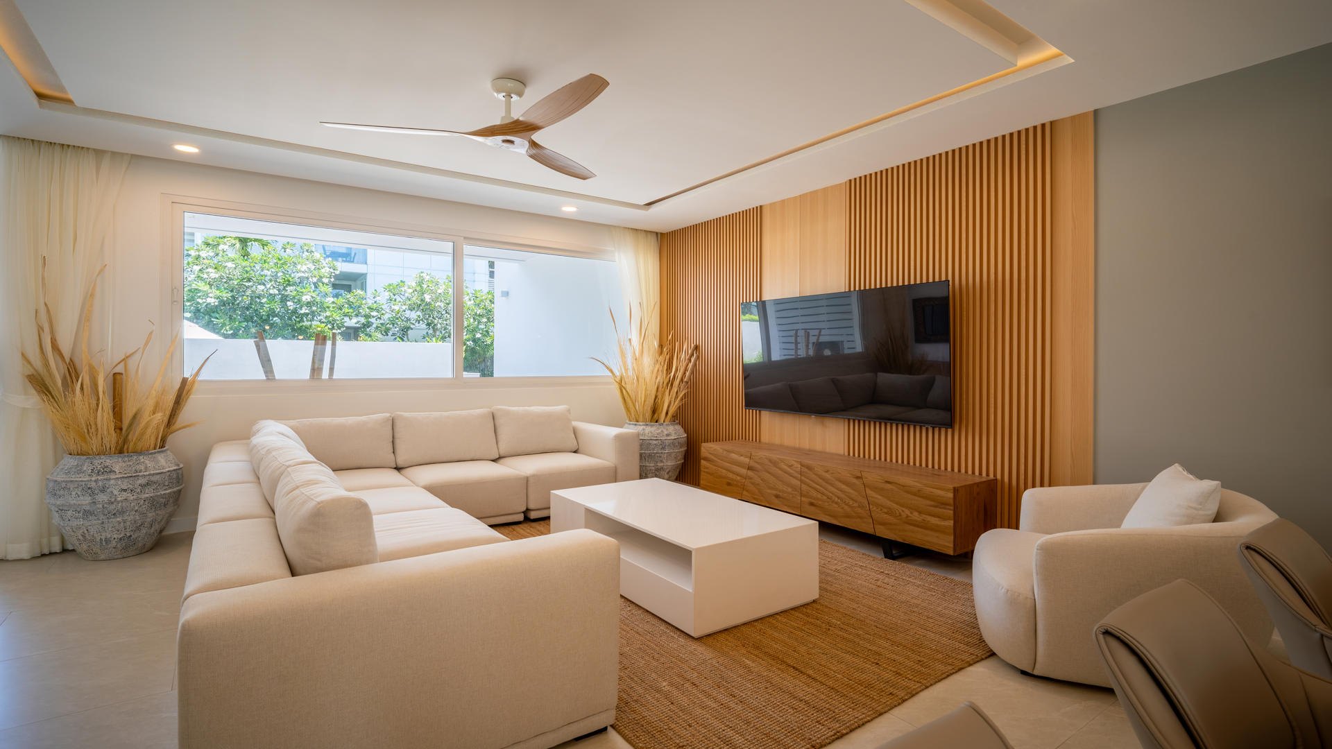 The living room across the front of the ground floor