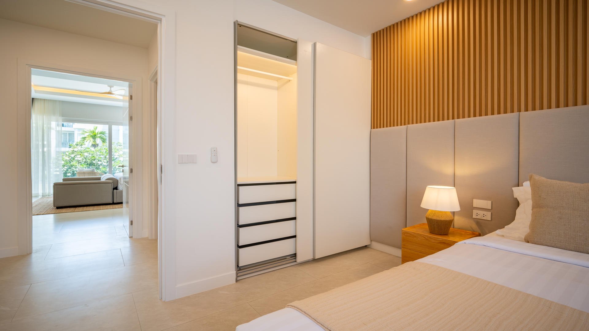 The dressing area and wardrobes off the master