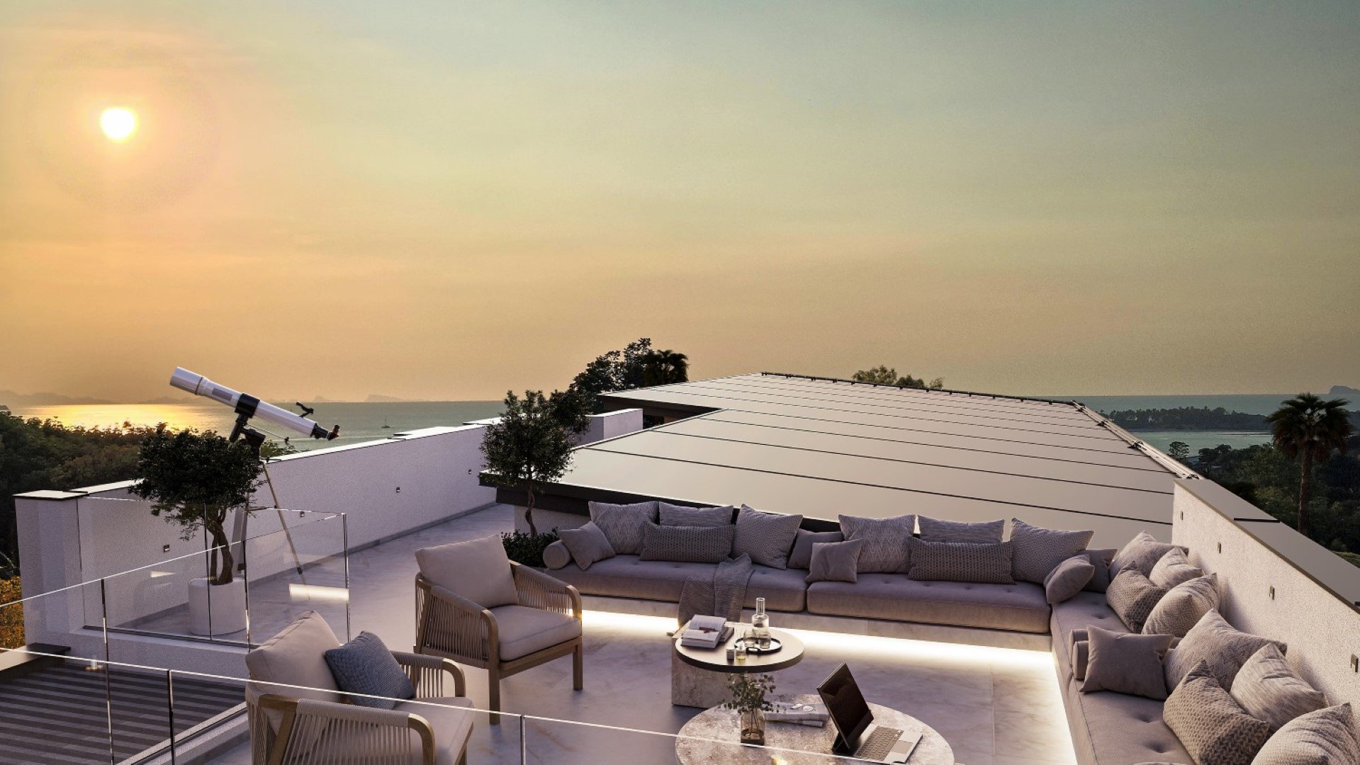 The roof terrace at sunset, seating around the view