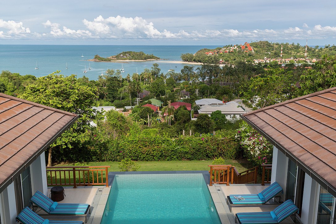 The pool and the bay beyond the rooftops