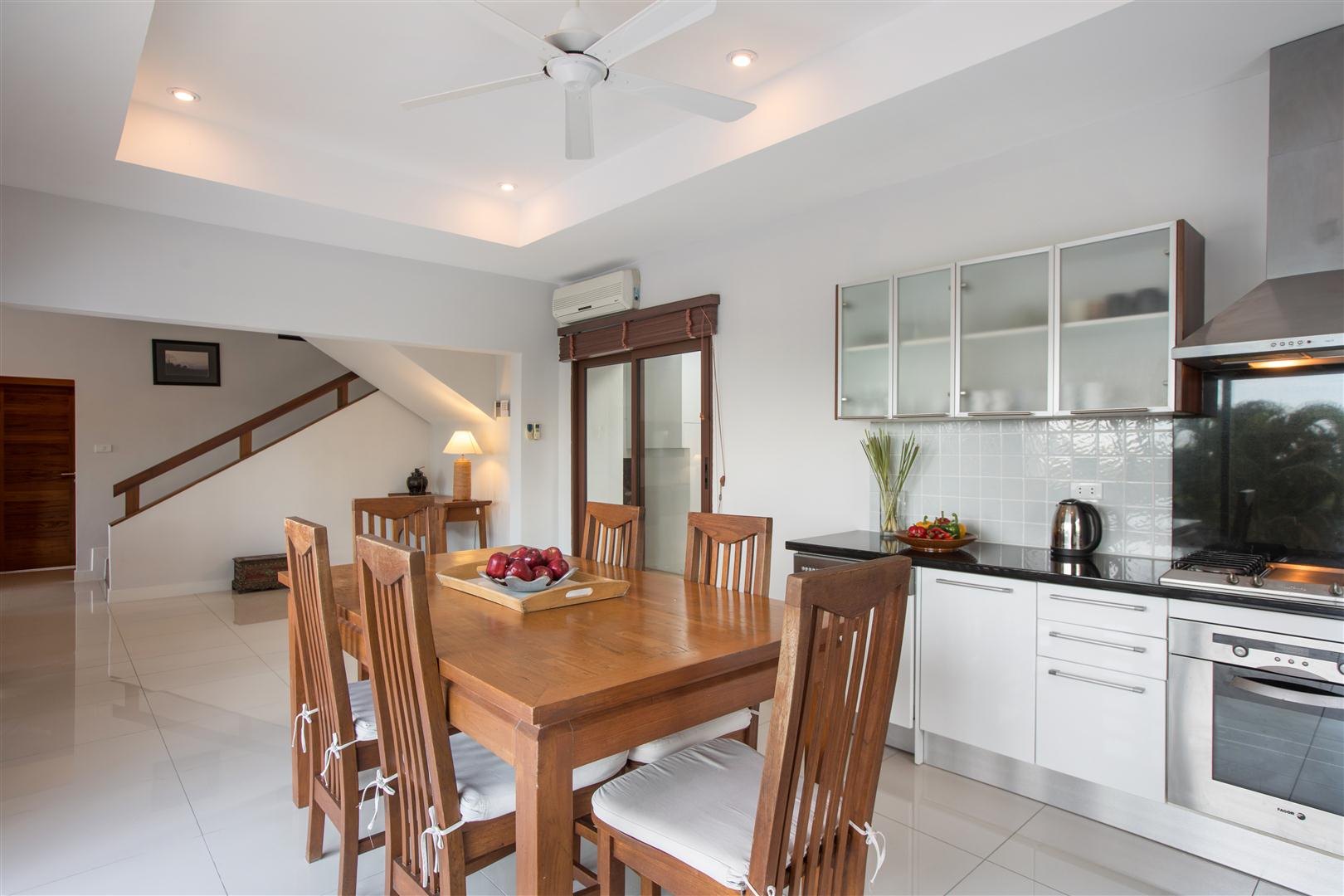 The fitted Western kitchen and the dining table