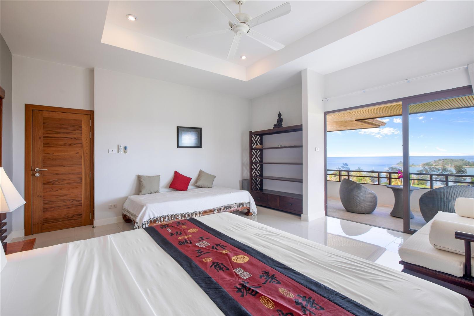 The master bedroom and its sea view balcony