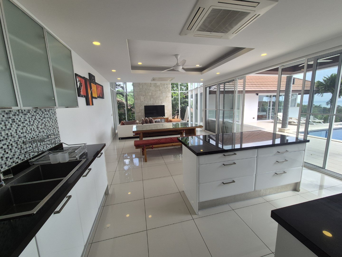 Kitchen island with the living area behind
