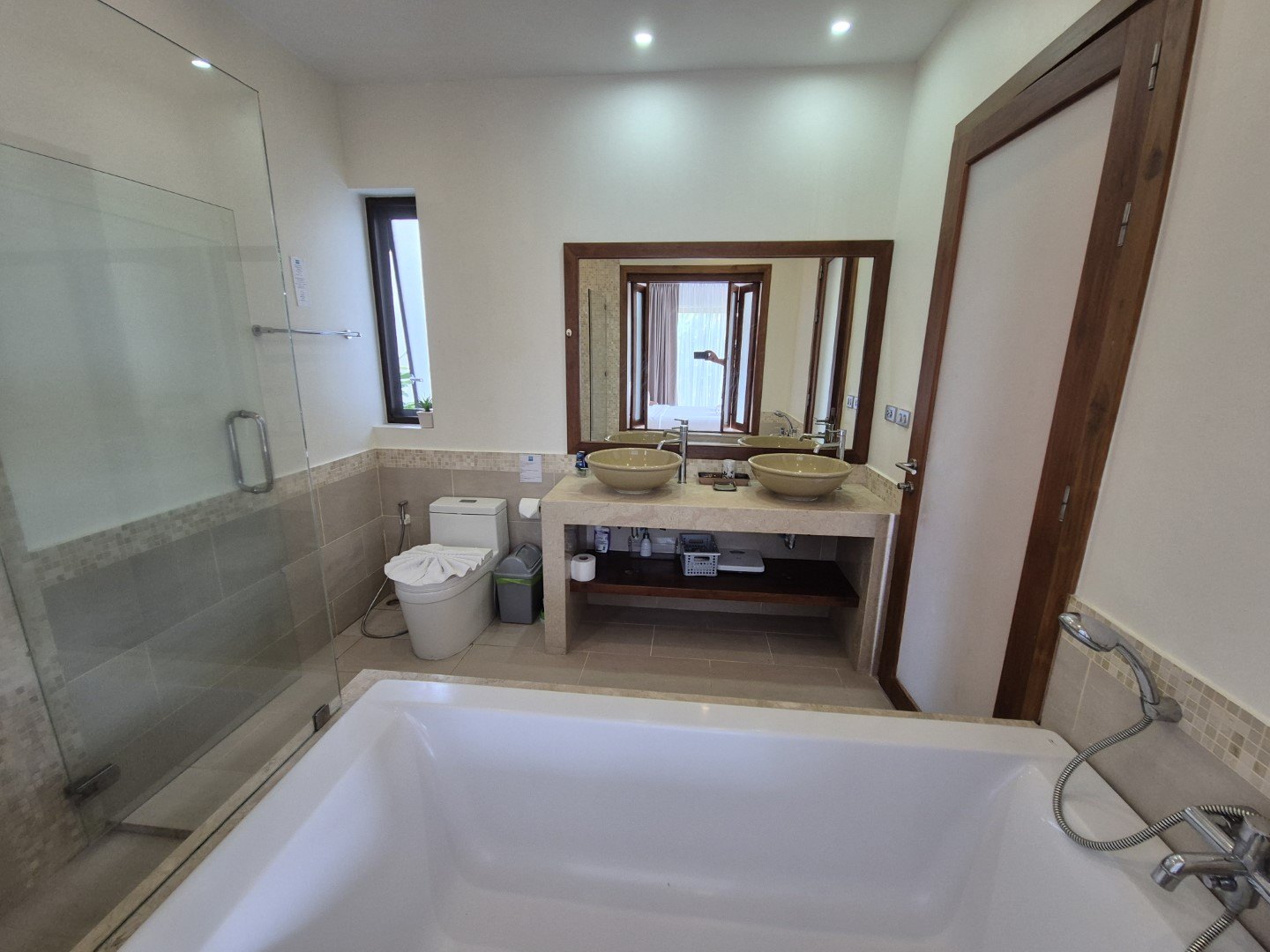 An en-suite bathroom with a bathtub