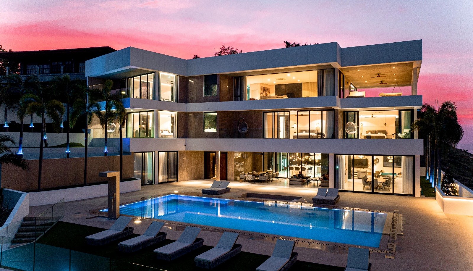 The villa from the pool at dusk