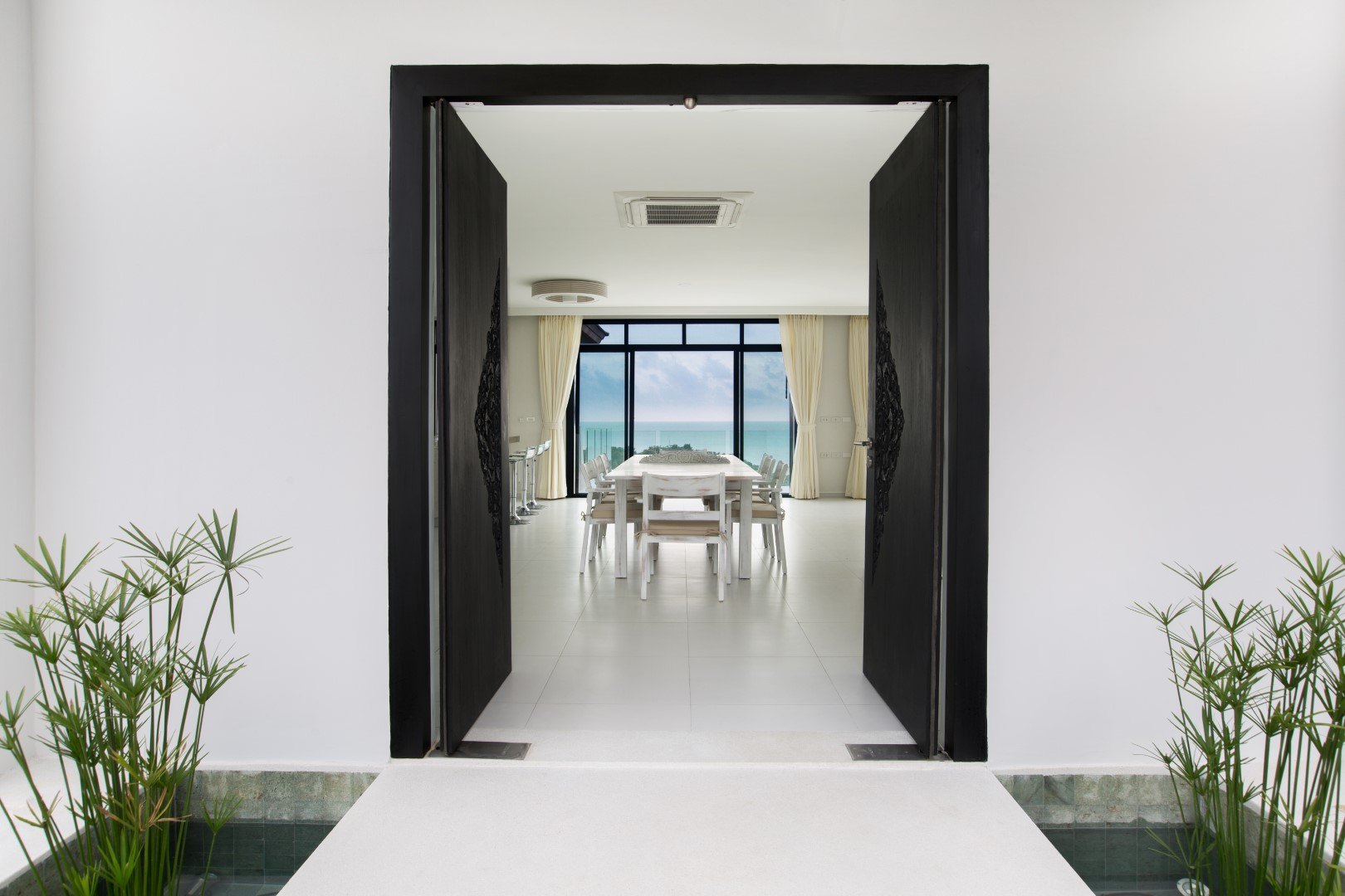 The dark entrance portal into the house
