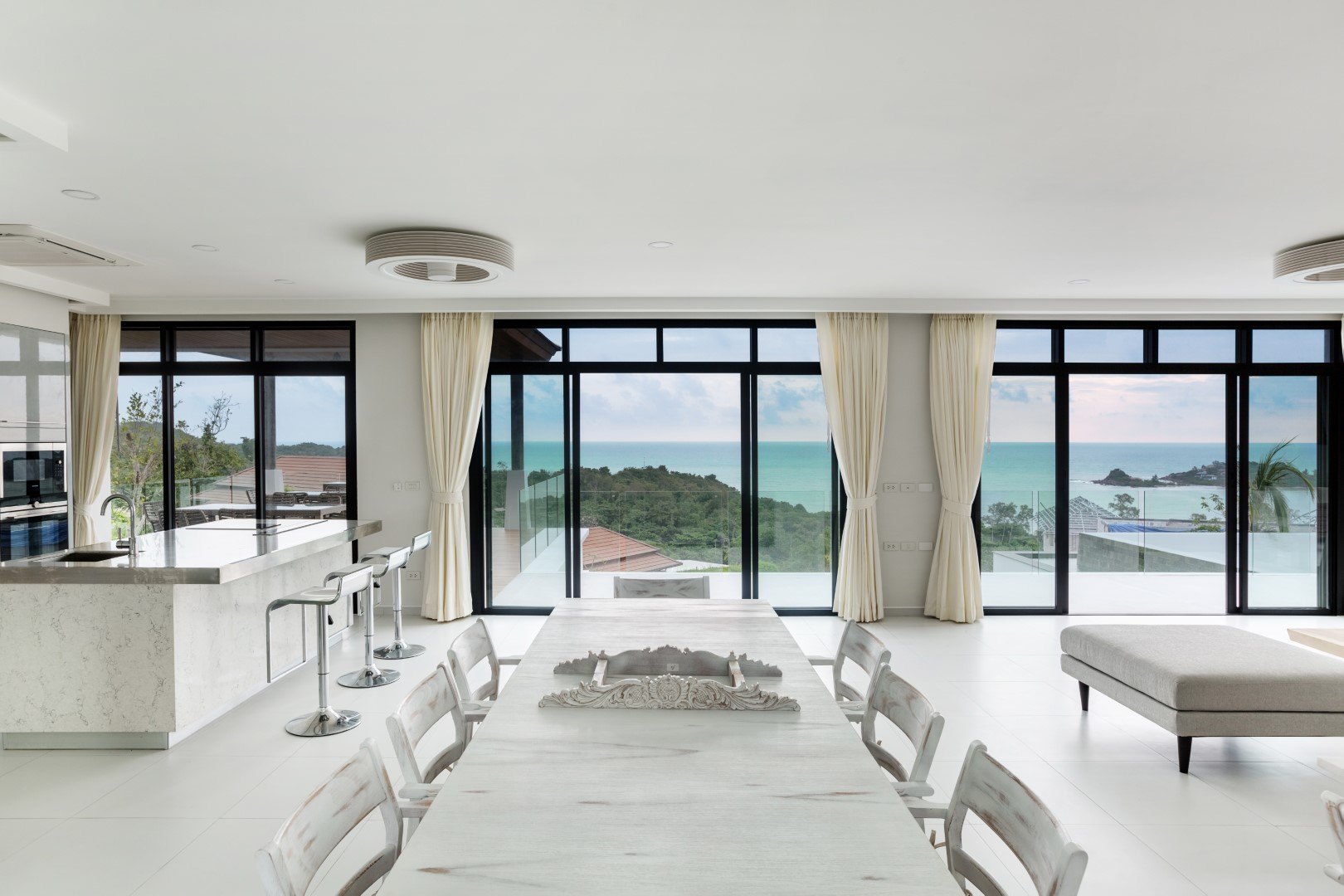 The lounge with full-height glass onto the view