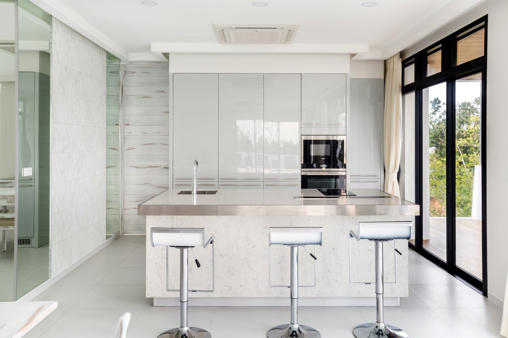 The kitchen island behind the living space