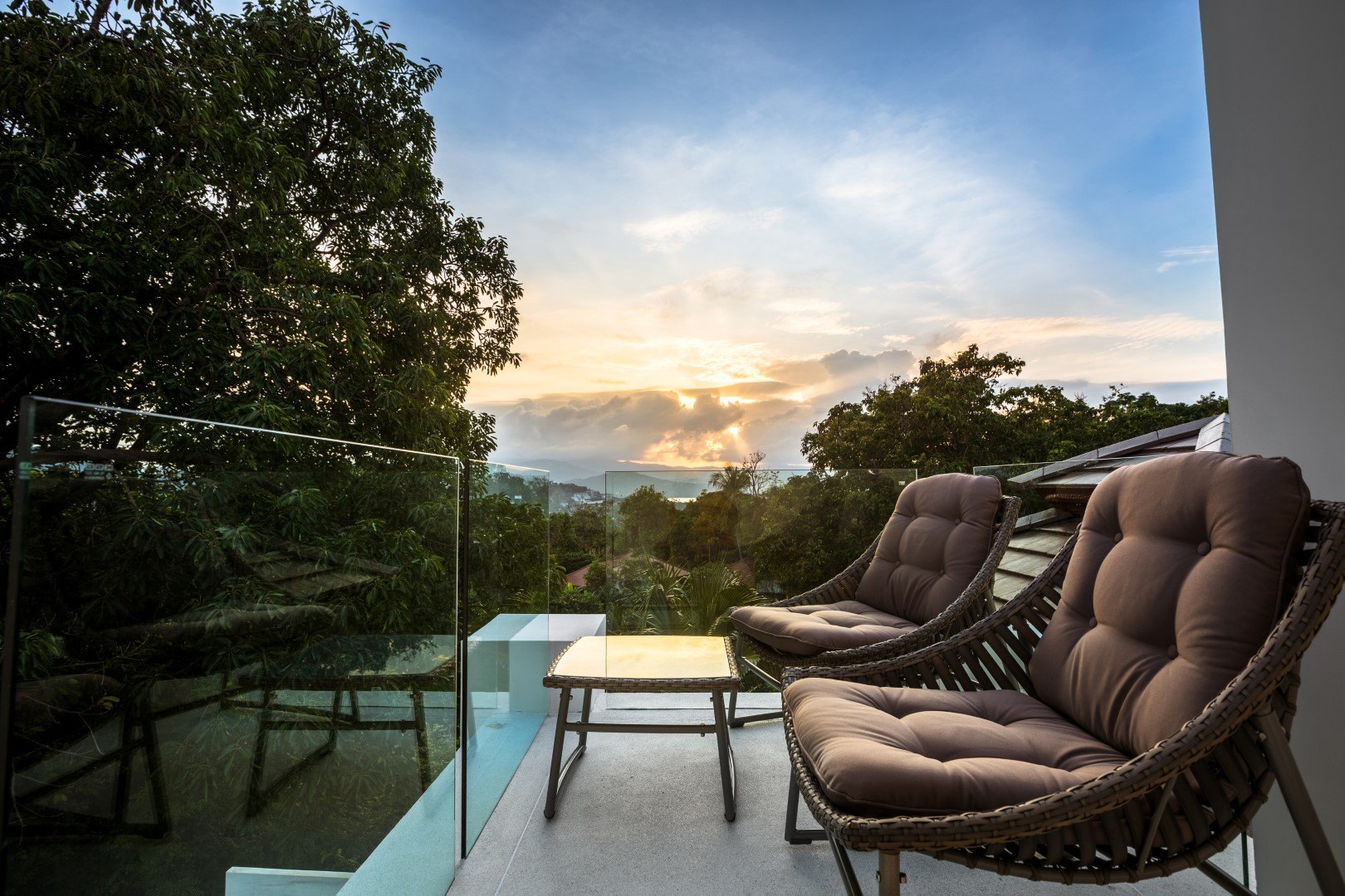 Chairs on the terrace at sunset