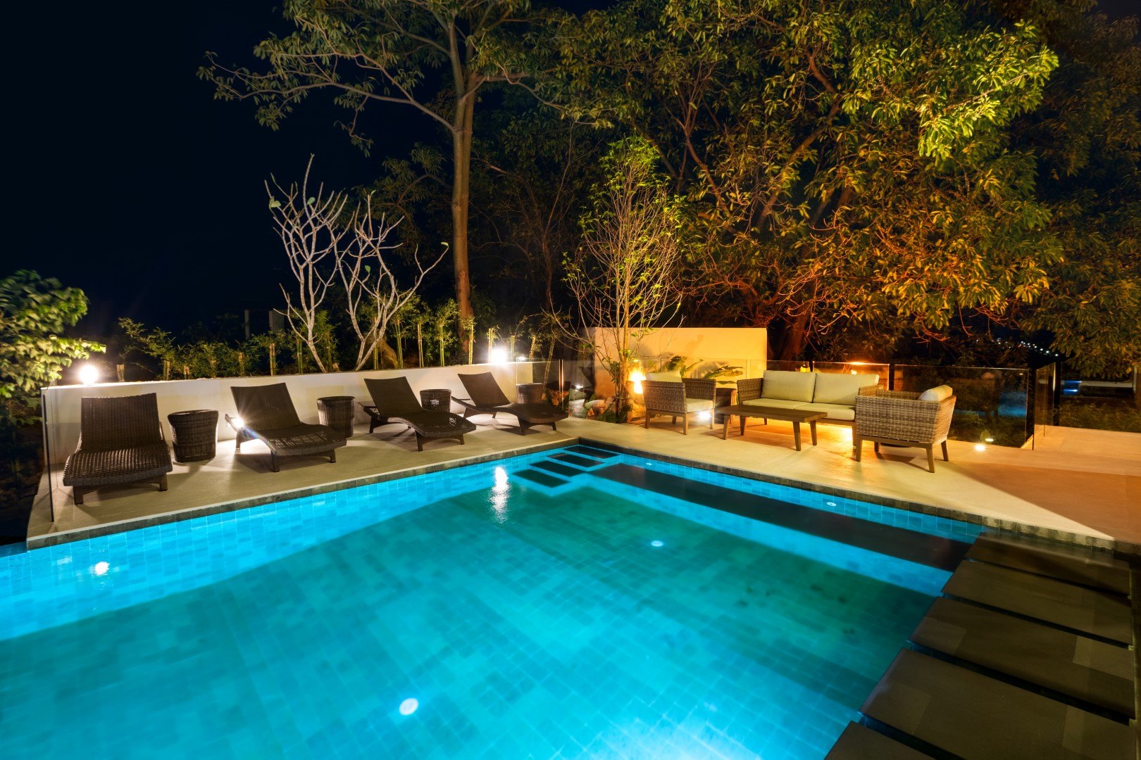 The pool lit at night