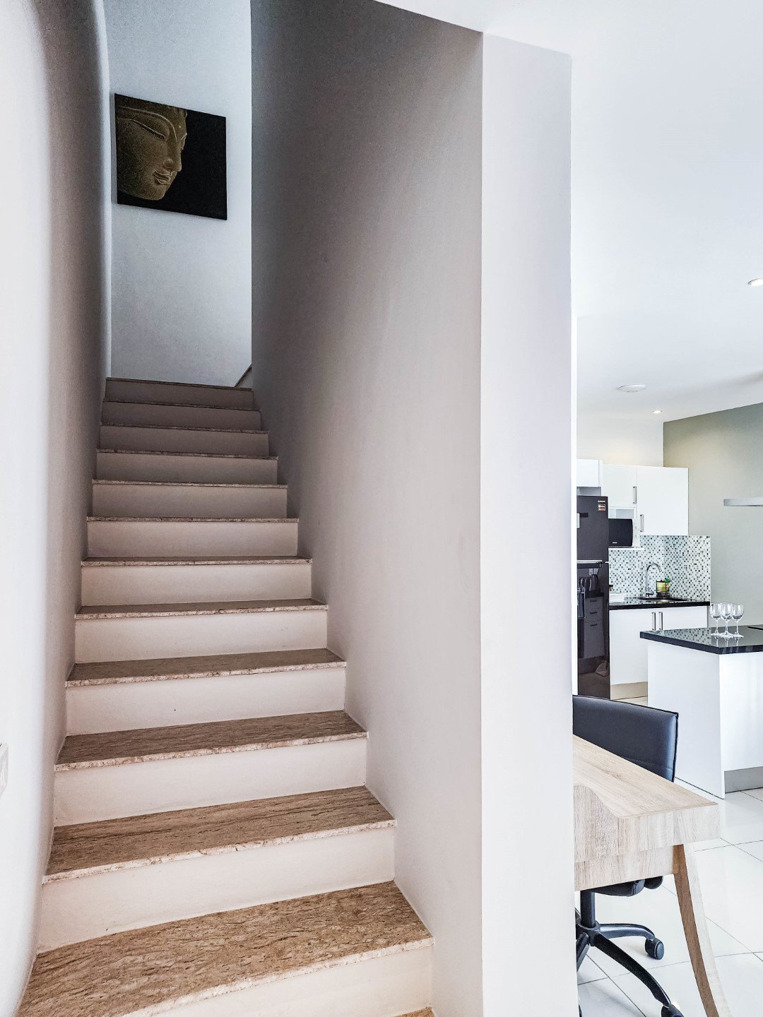 The staircase up to the bedroom floor