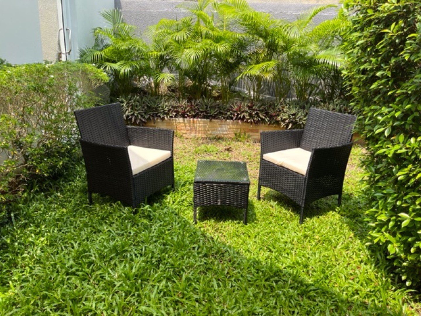 A seating area in the residence gardens