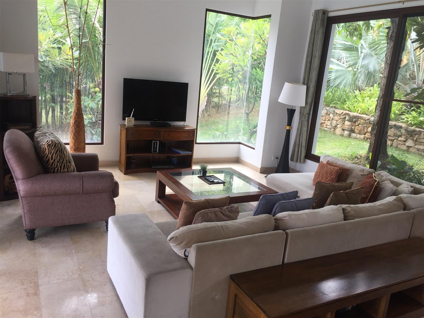 The living space under its high ceiling