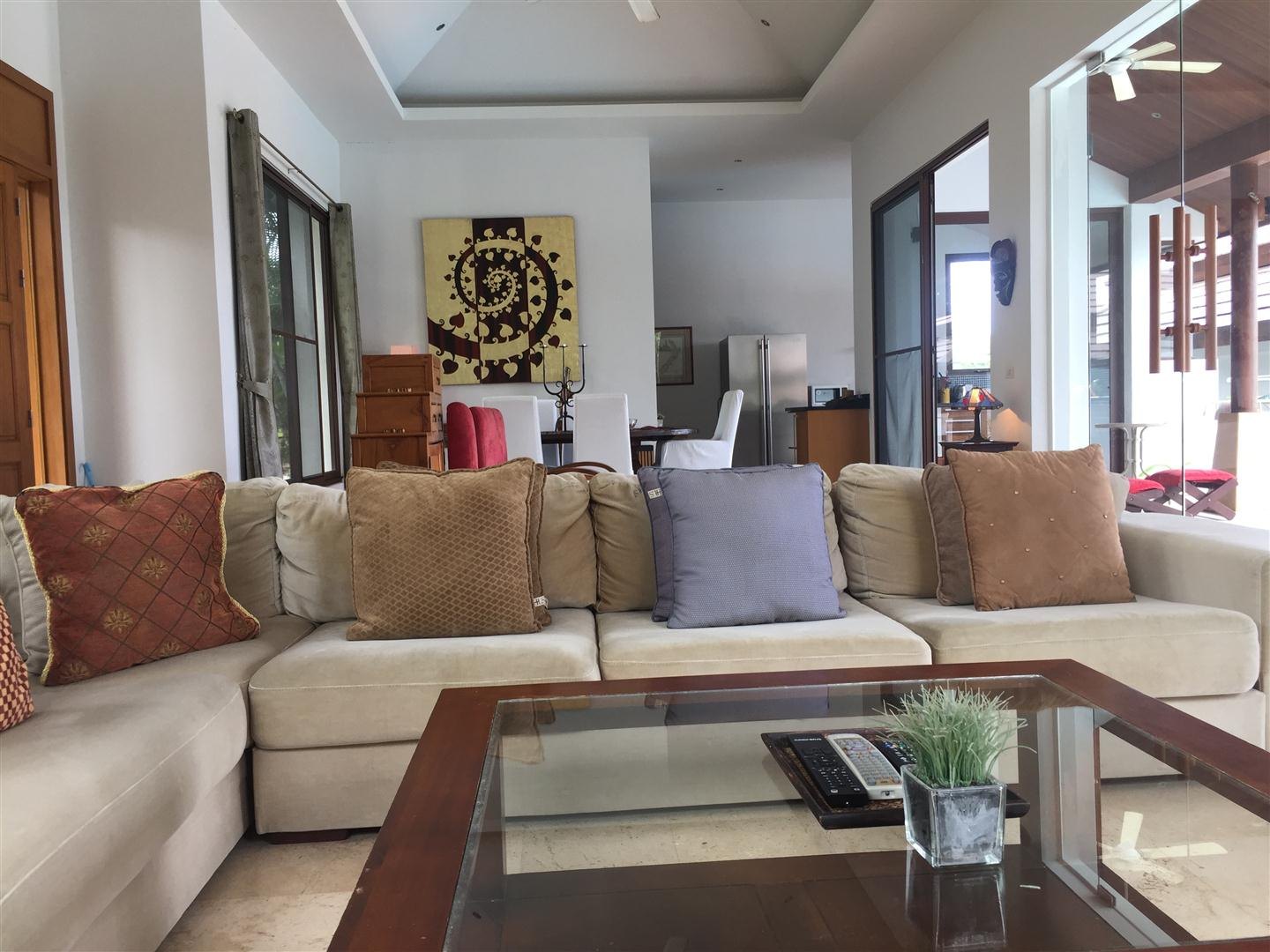 The lounge seating and the terrace doors