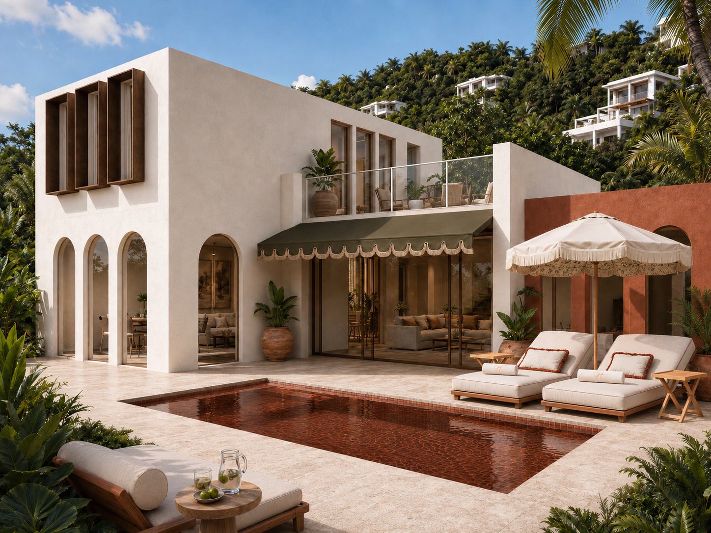 Pool terrace of the three-bedroom villa, hillside behind