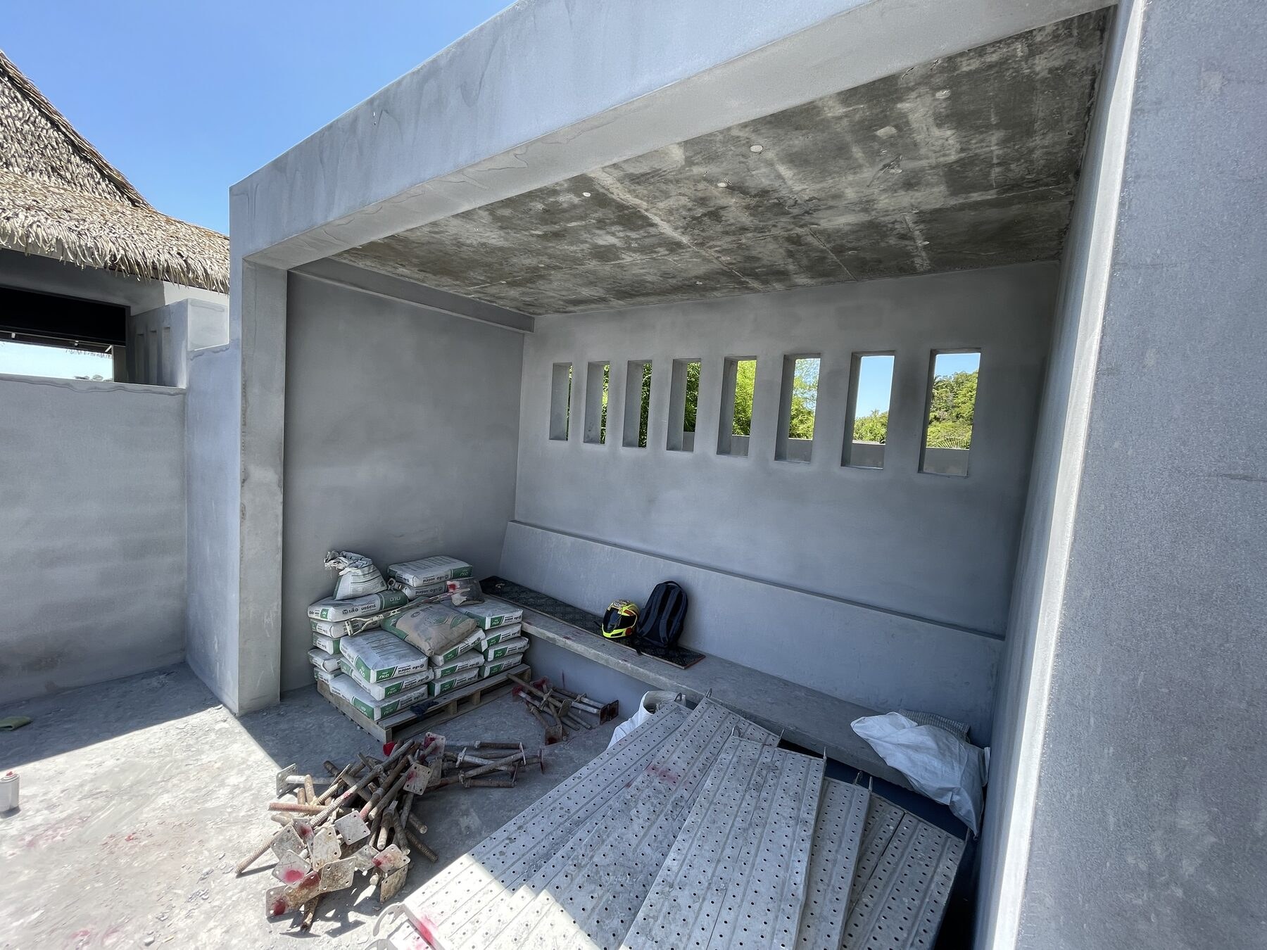An unfinished room with materials still on the floor