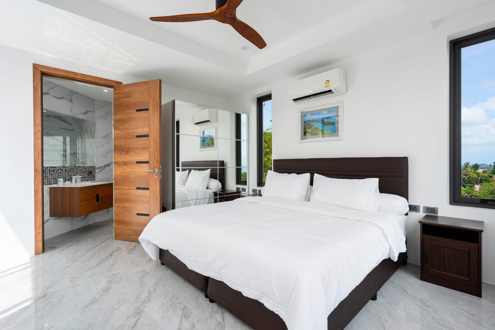 Bedroom with its marble en-suite bathroom