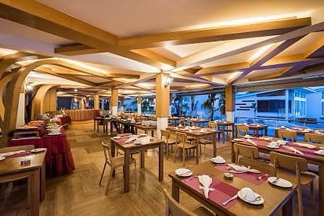 Restaurant seating under the timber roof