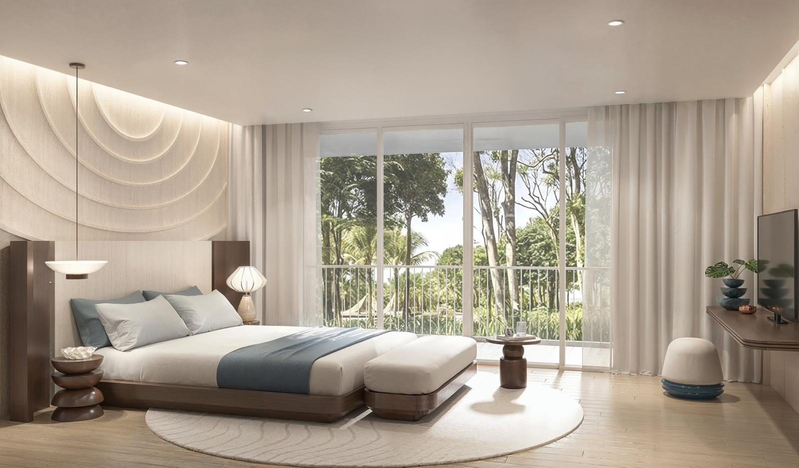 A bedroom opening onto the balcony
