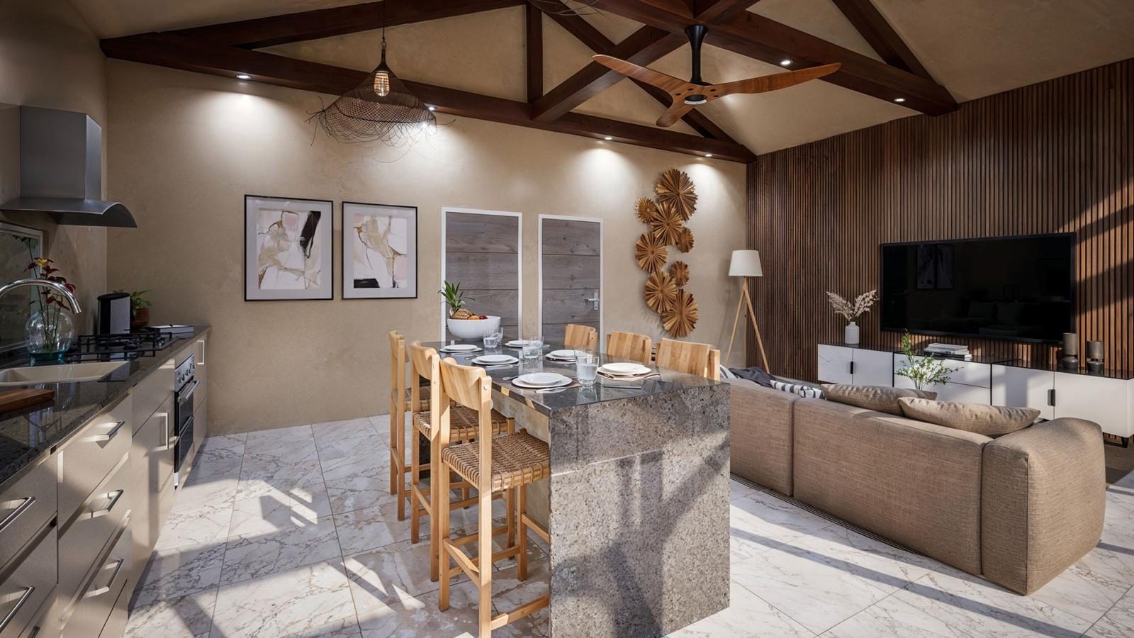 Open-plan kitchen, dining and living space under a vaulted ceiling