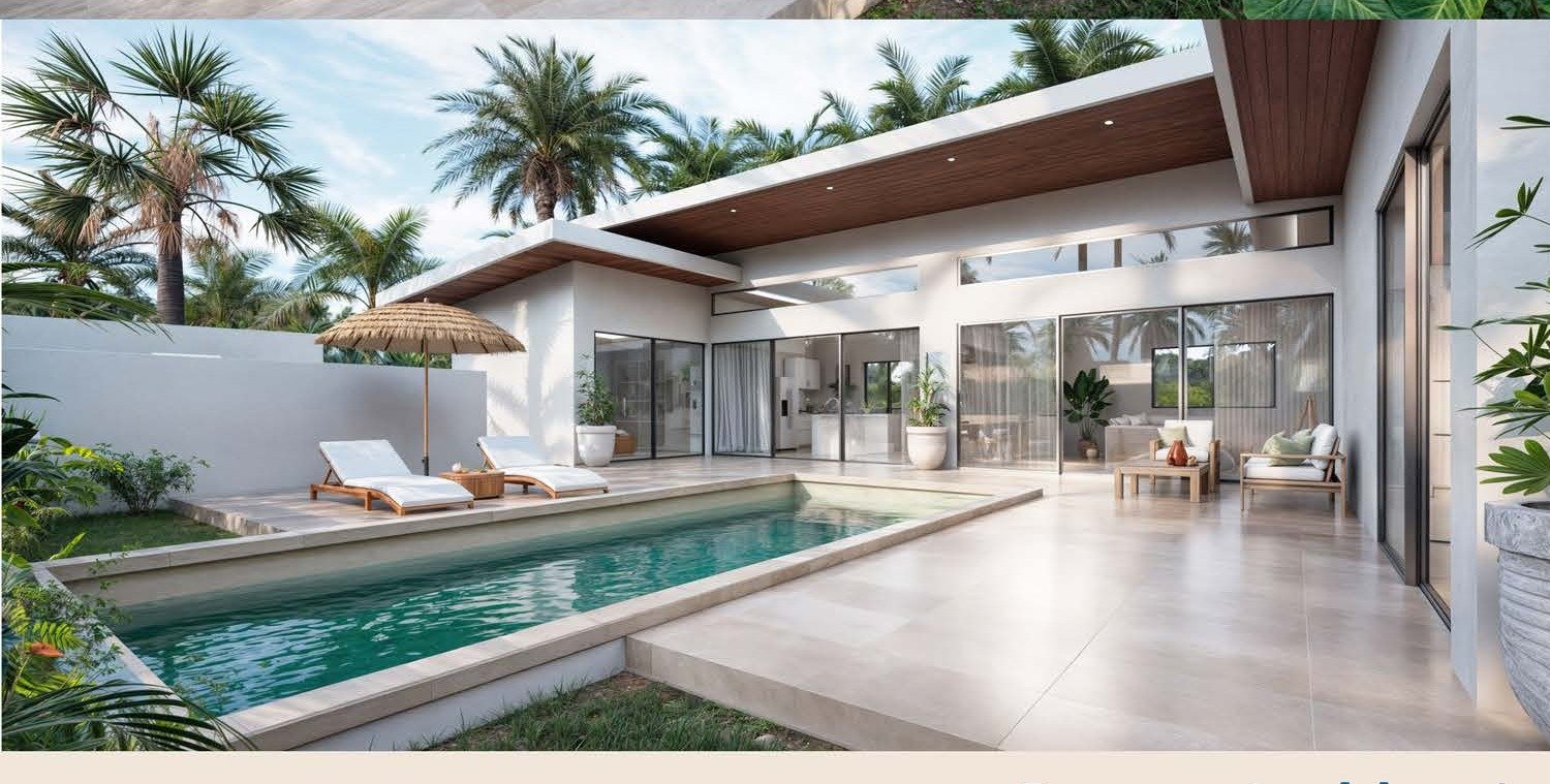 Pool with sun loungers alongside the villa