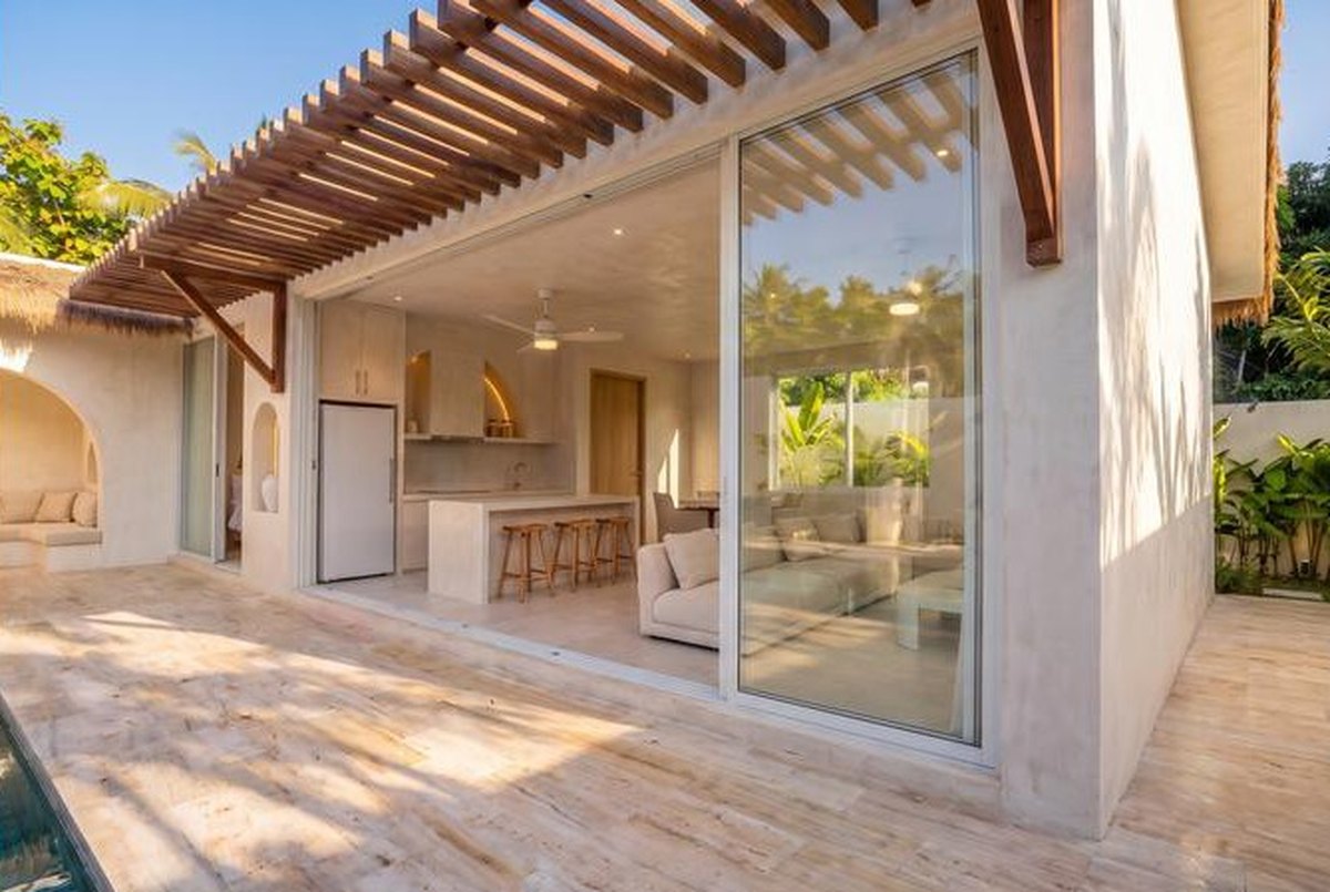 Living room and kitchen of the one-bedroom villa