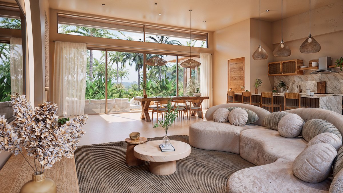 Open living room and kitchen with a curved sofa and high glazing