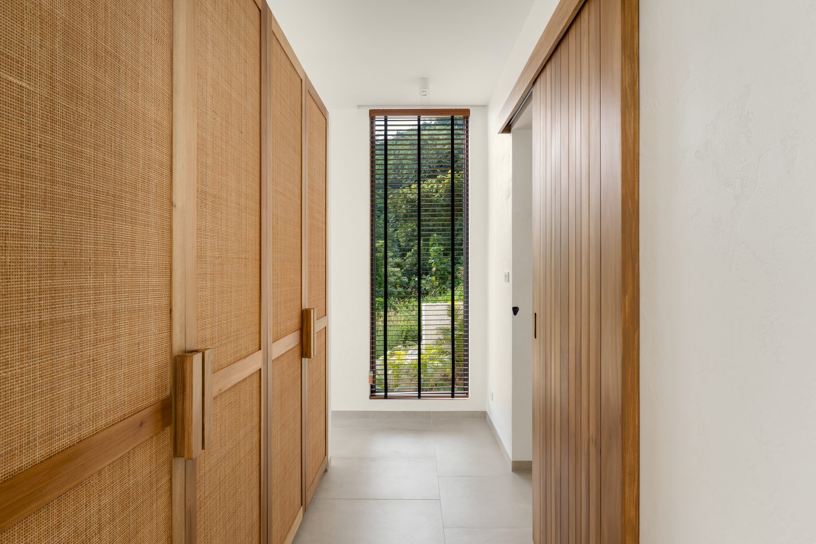 Bedroom opening to the pool
