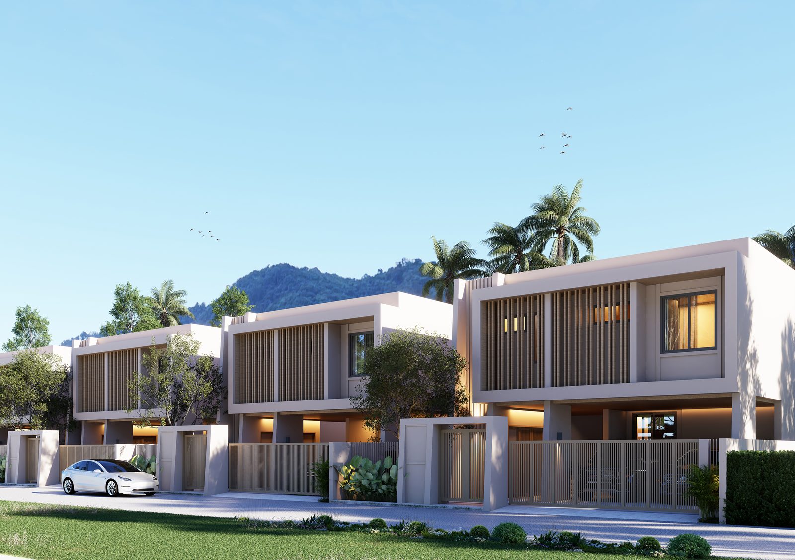 A pair of two-storey villas behind their entrance walls