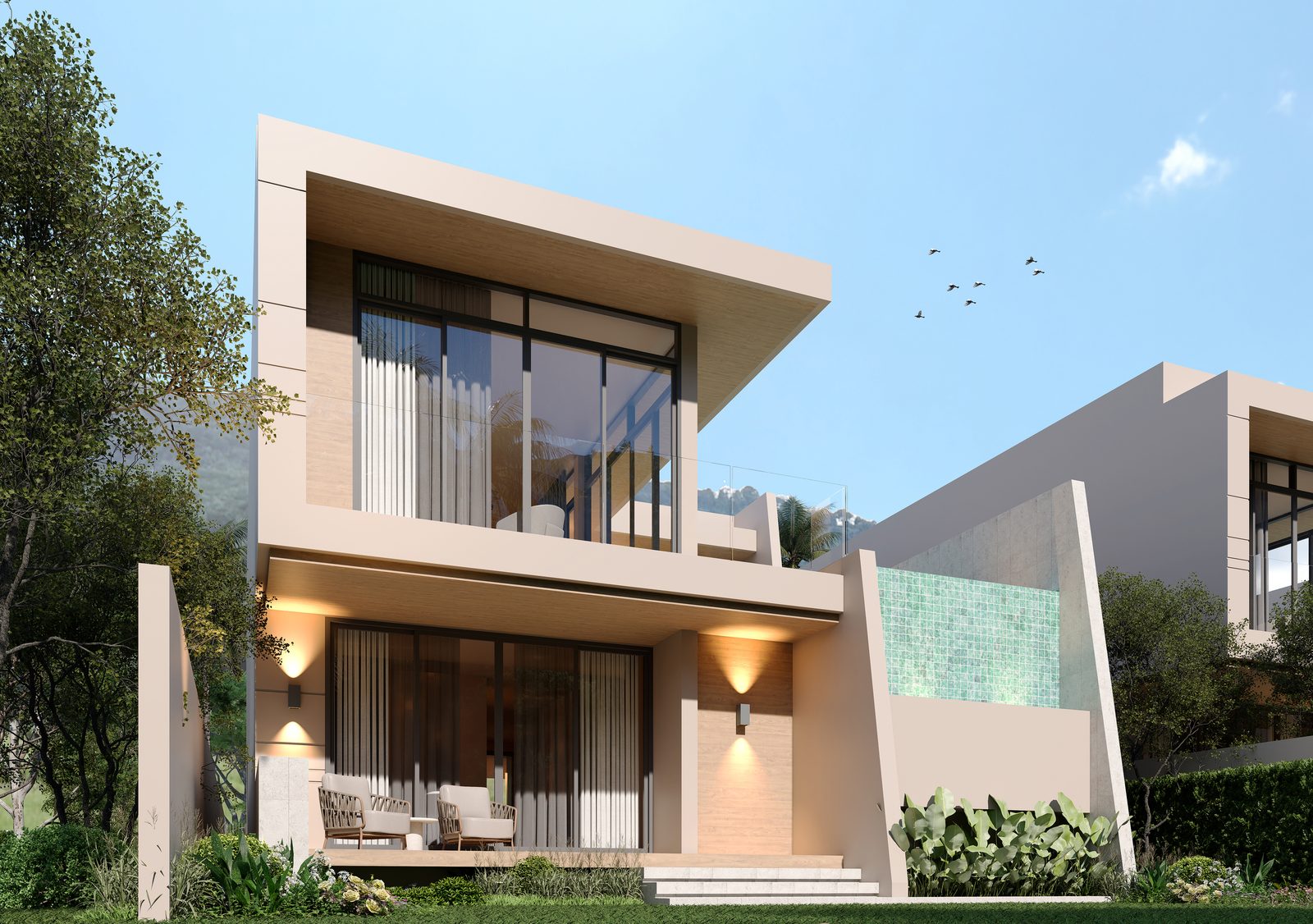 Villa exterior with the green-tiled pool wall and tropical planting