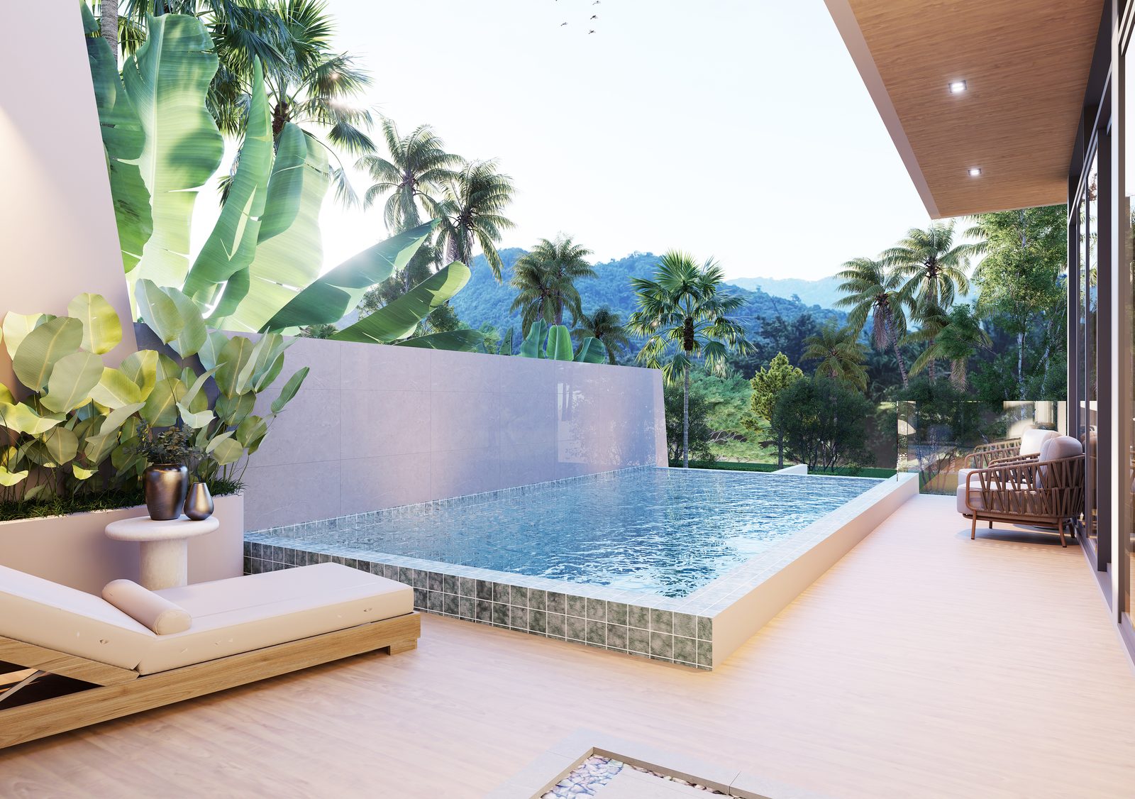 Private pool and sun lounger beside the covered terrace