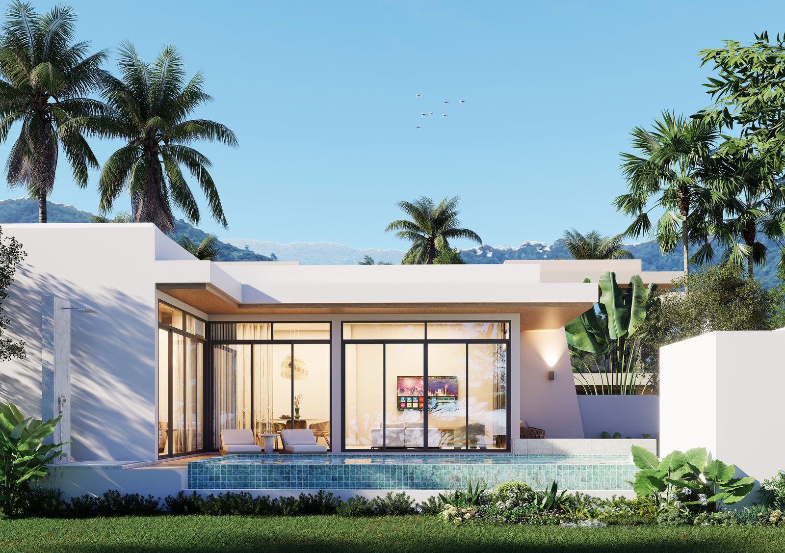 Two-bedroom villa and its pool at dusk