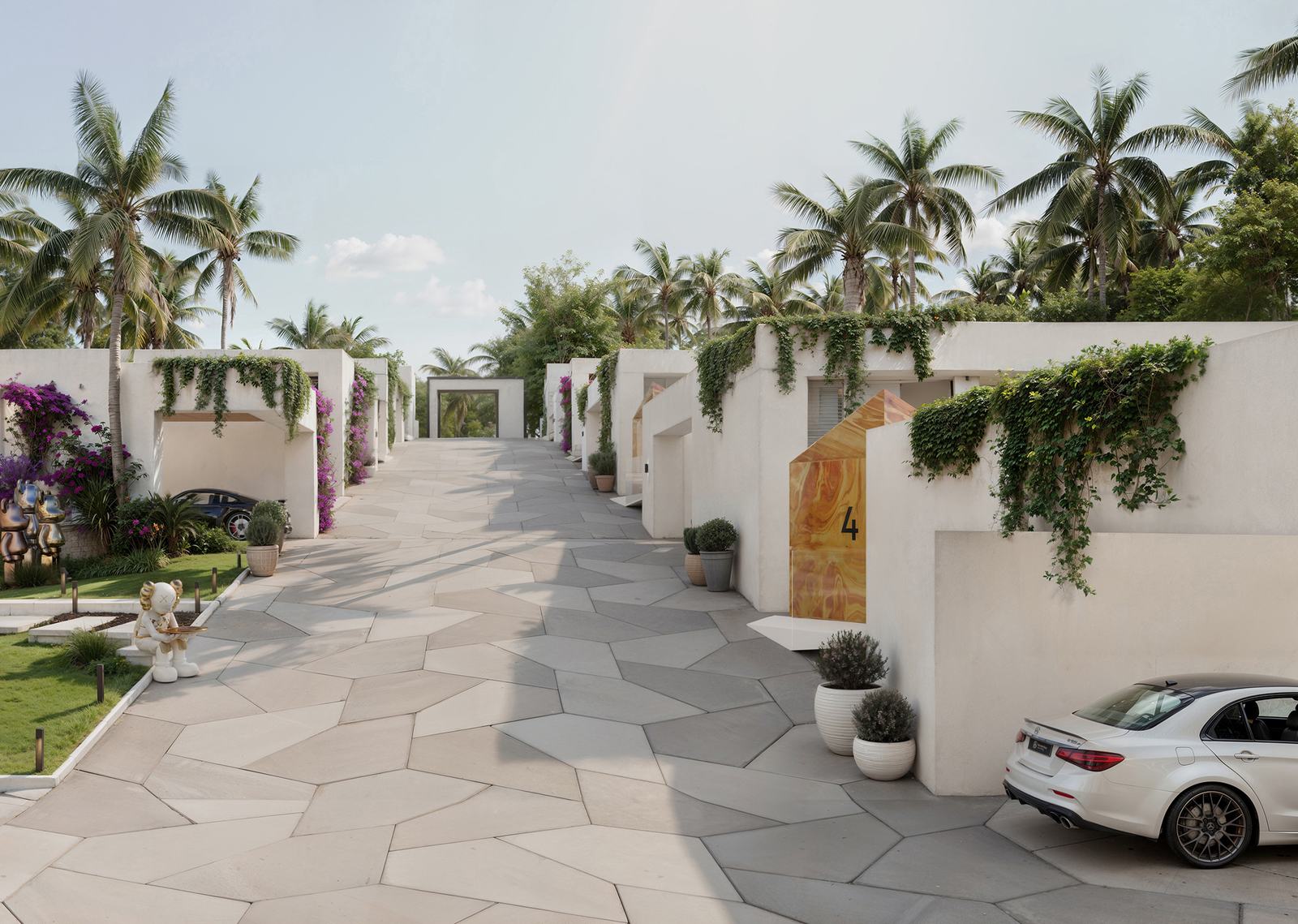 Paved estate street between the villa entrances