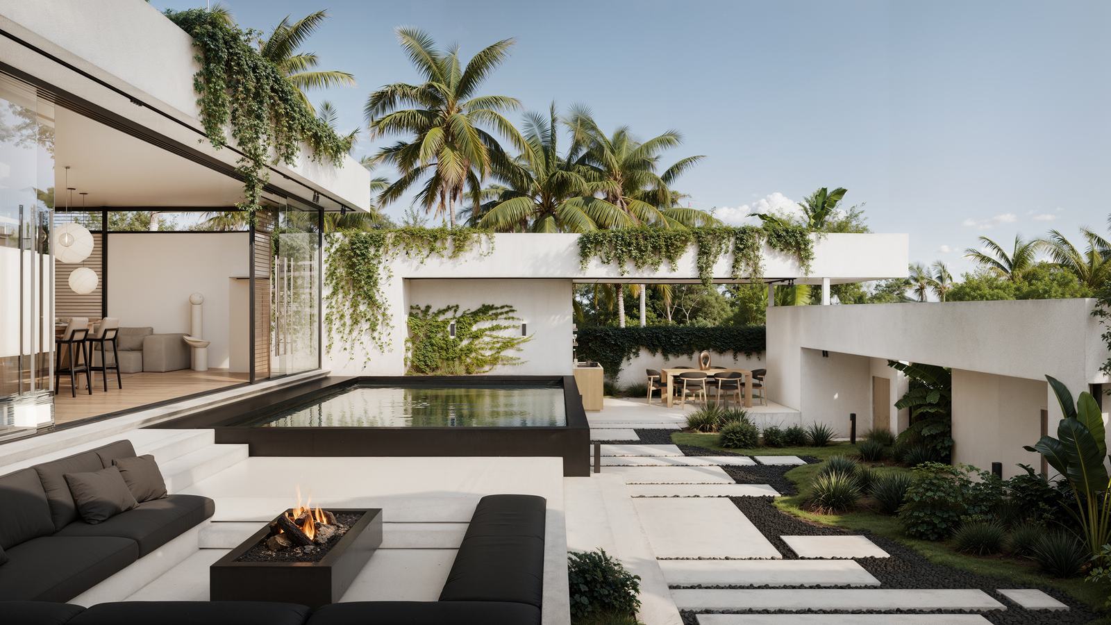 Sunken lounge with a fire table beside the pool
