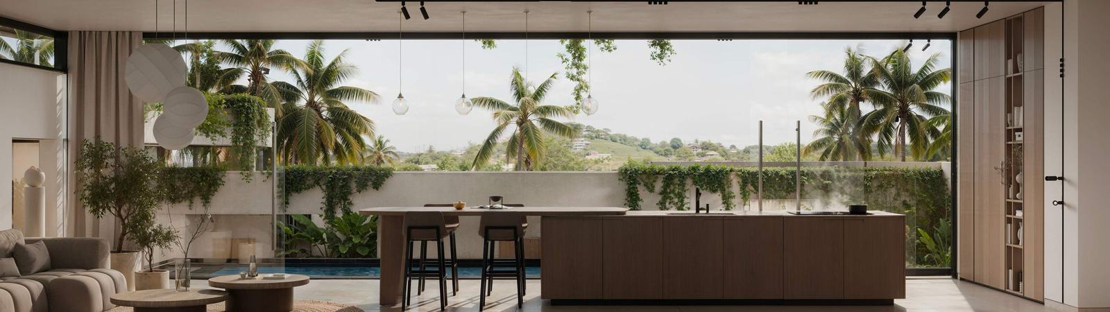 Living room and kitchen island open to the terrace