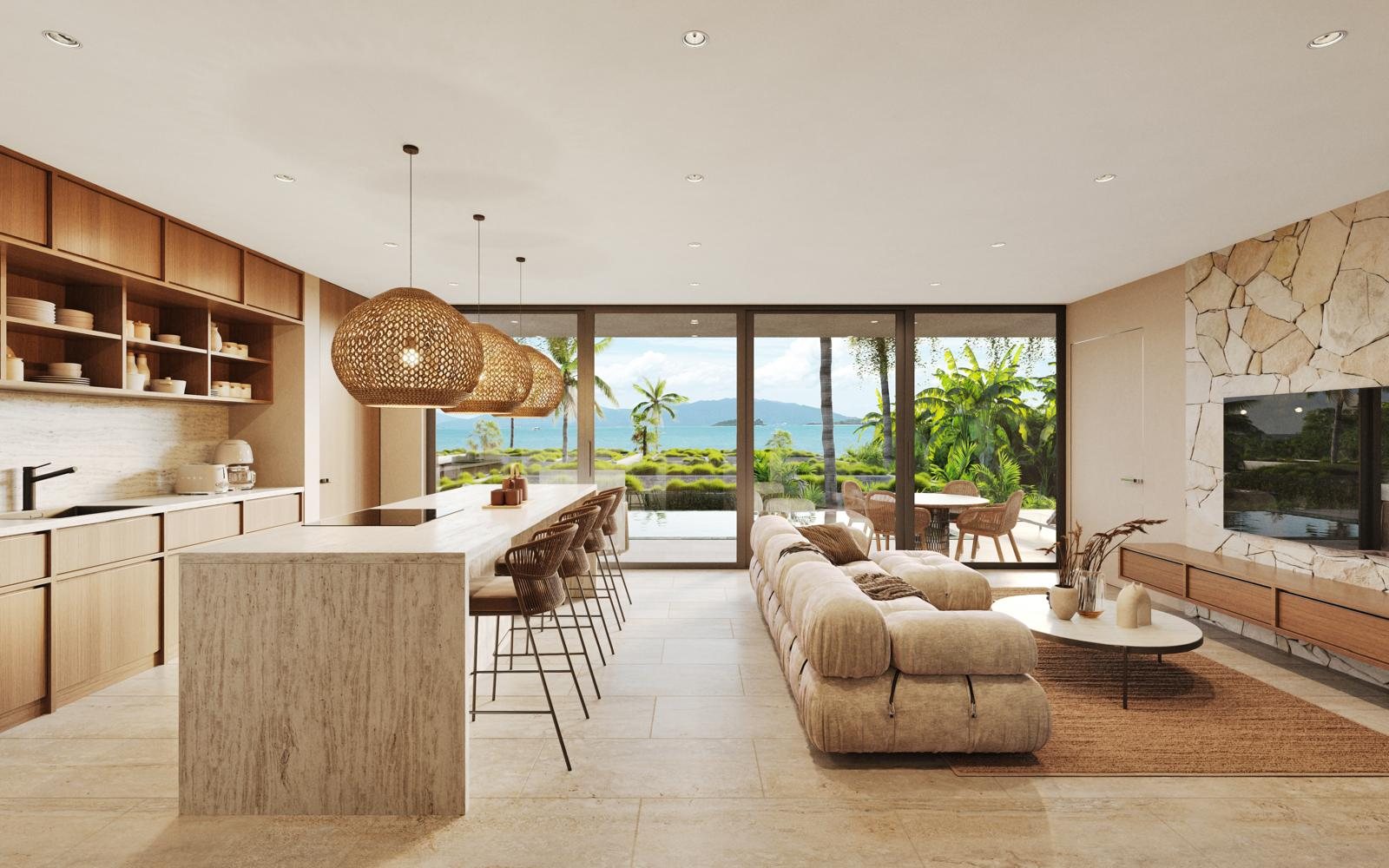 Open-plan kitchen, island and living room facing the sea