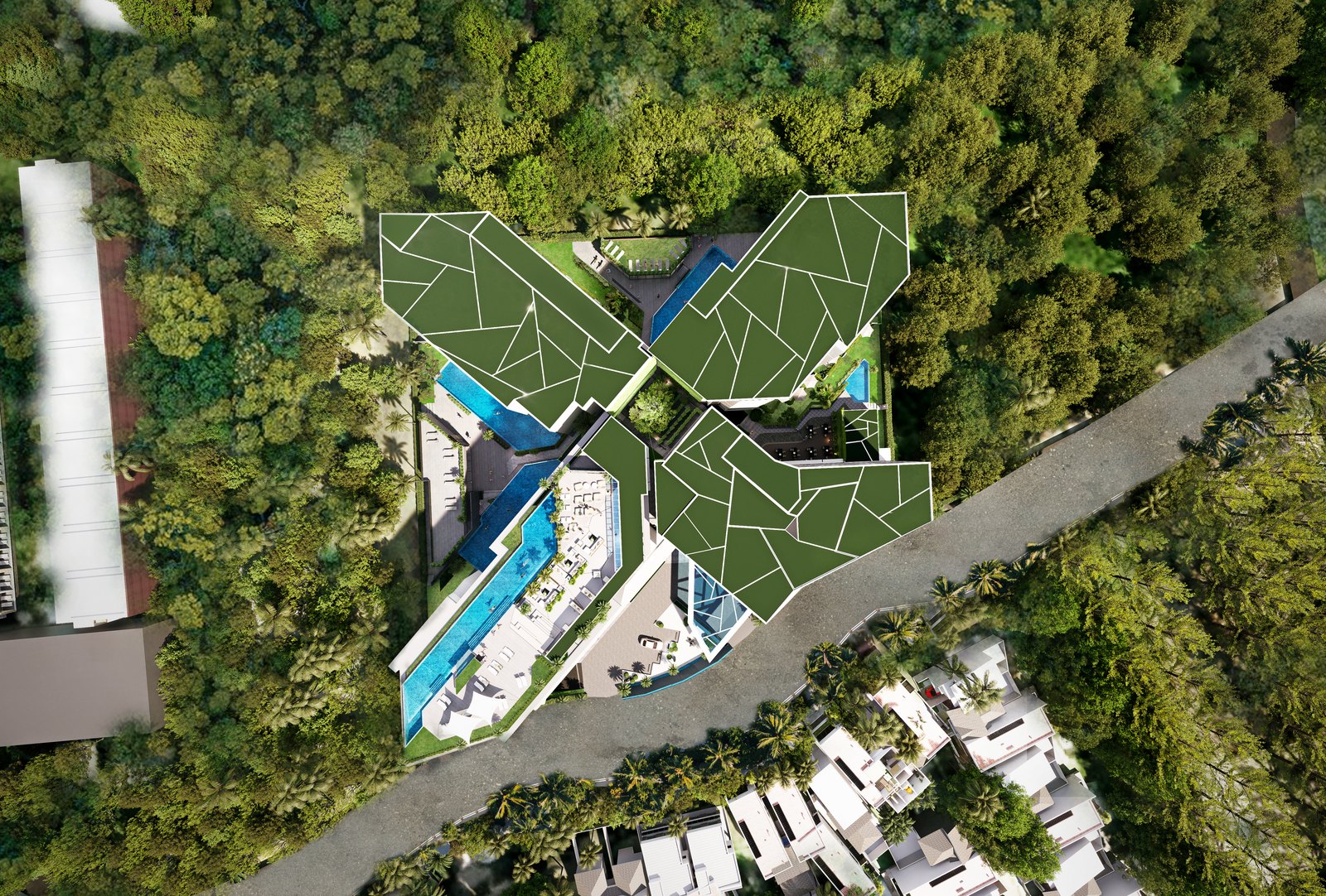 The X-shaped roofs seen from directly above, among the trees
