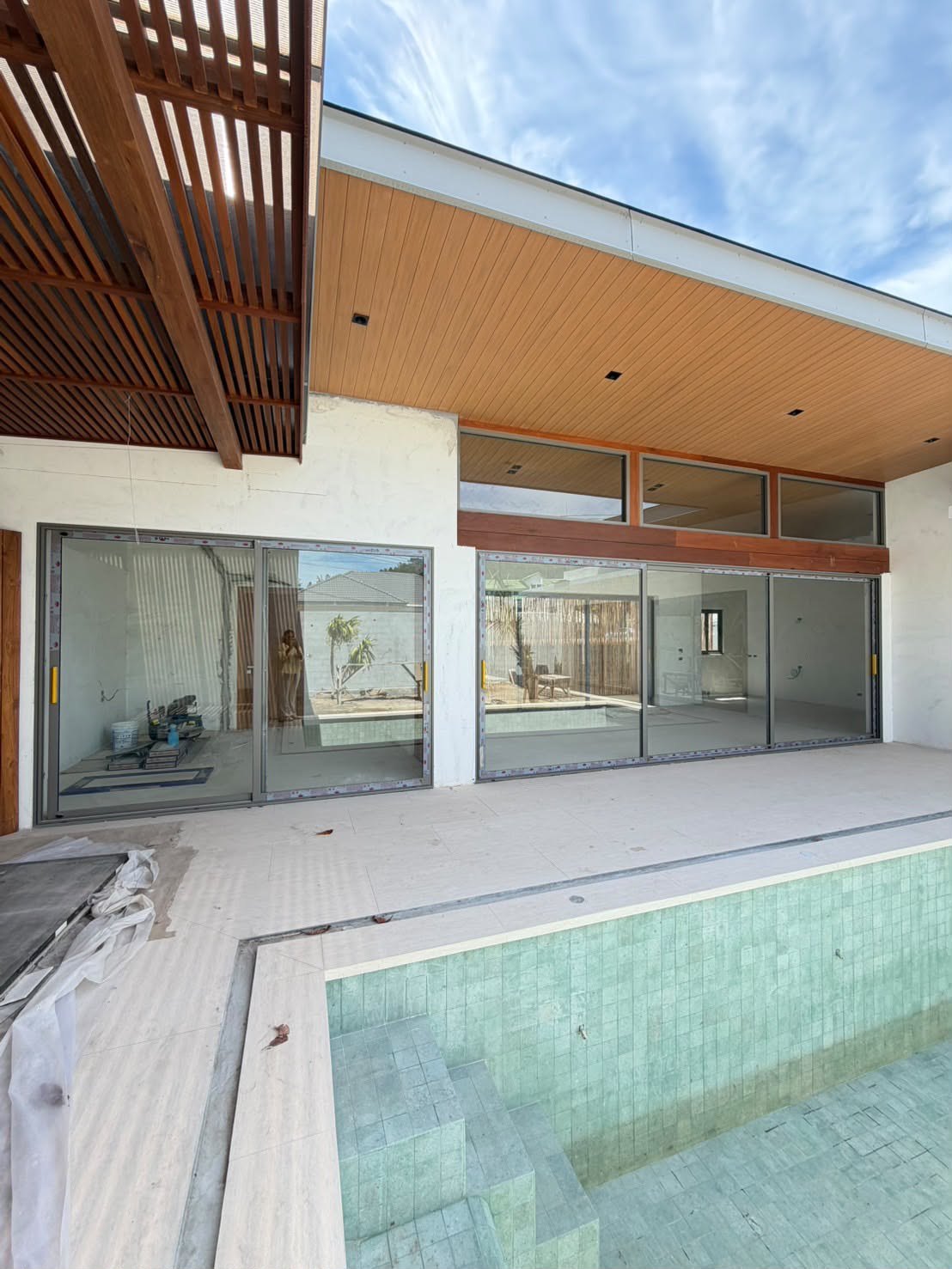 Looking out from the living room to the pool